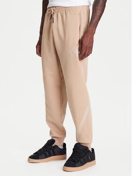 adidas Sportinės kelnės · Smėlio · Relaxed Fit