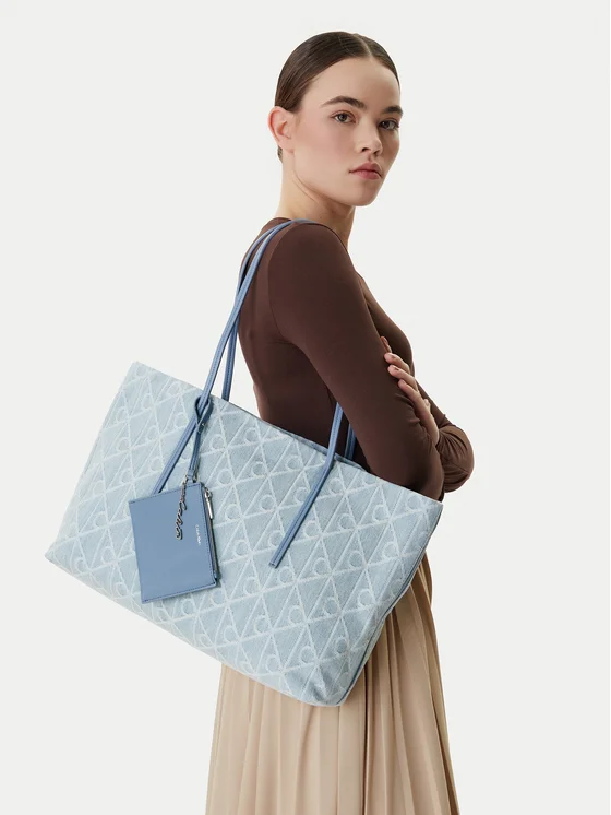 Calvin Klein Rankinė Calvin Klein Emblem Aop Denim Tote W/ Pouch LV04F3428G Mėlyna
