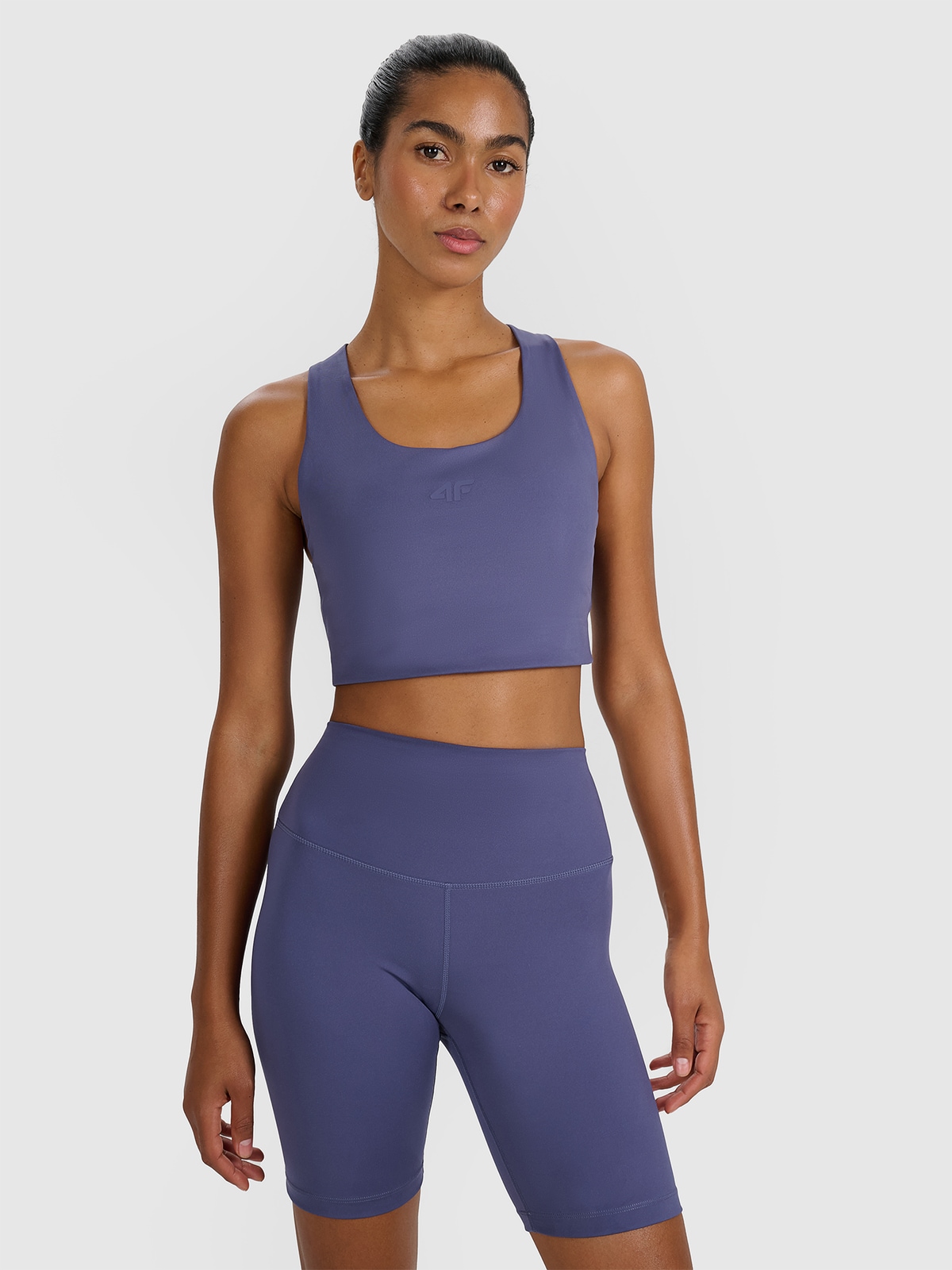 Treniruočių liemenėlė užtikrinanti mažą paramą - tamsiai mėlyna