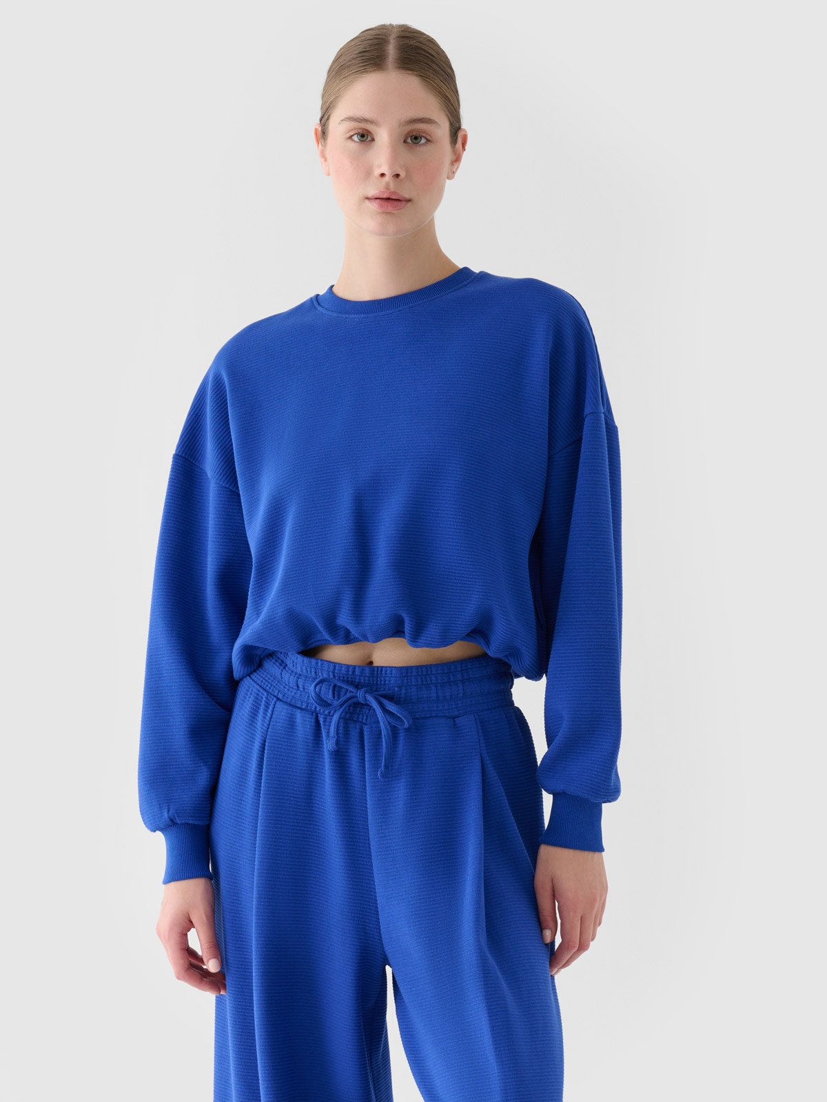 Moteriškas sportinis neatsegamas džemperis be gobtuvo - mėlynas