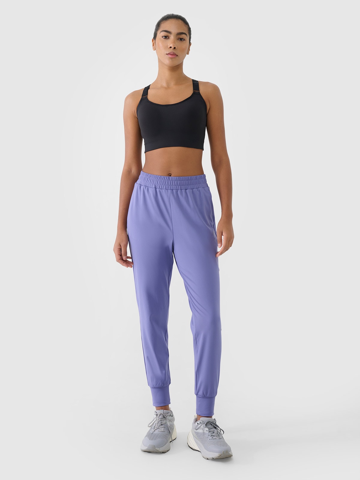 Moteriškos greitai džiūstančios treniruočių kelnės - tamsiai mėlynos