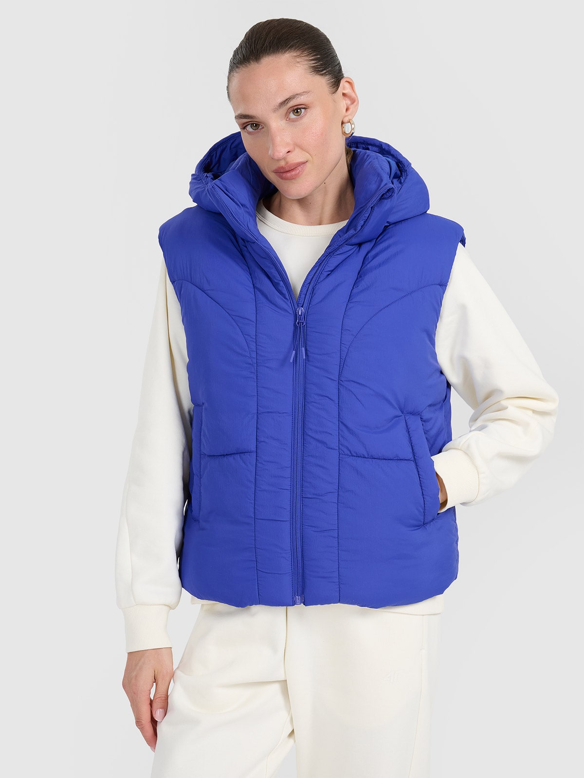 Moteriška pūkinė berankovė striukė su sintetiniu kamšalu - mėlyna