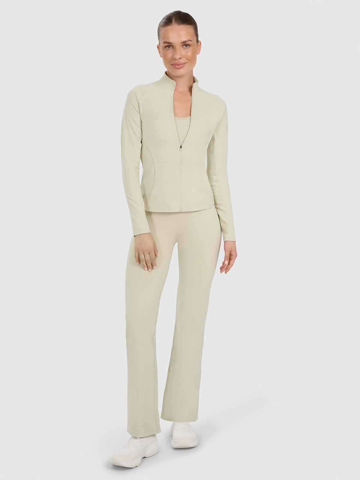 Moteriškos greitai džiūstančios treniruočių kelnės su lygiomis klešnėmis, smėlio spalvos