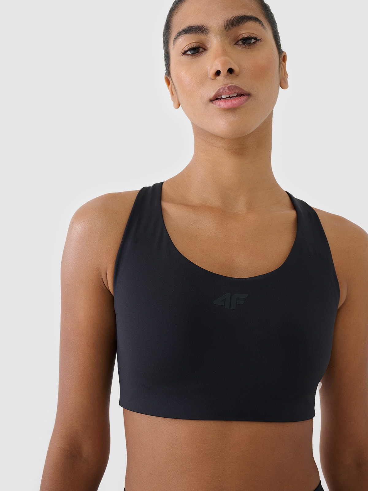 Treniruočių liemenėlė užtikrinanti vidutinę paramą - juoda