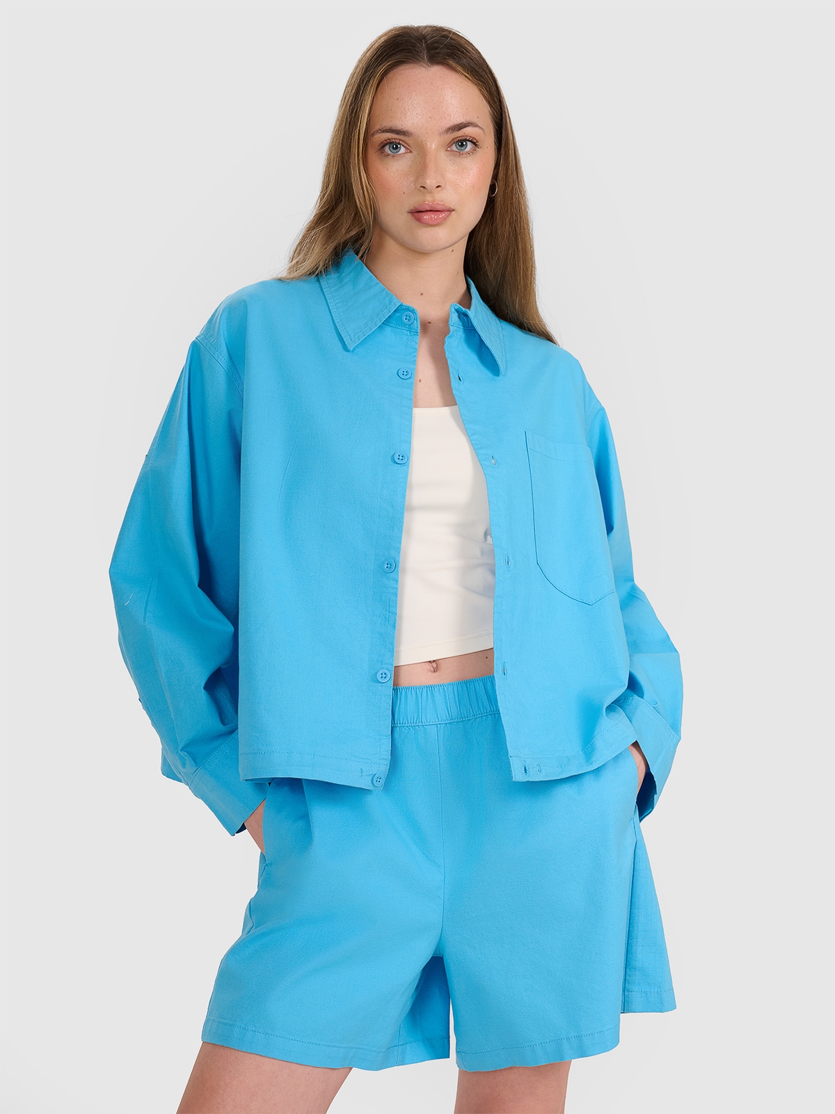 Moteriški oversize marškinėliai su apykakle - mėlyni