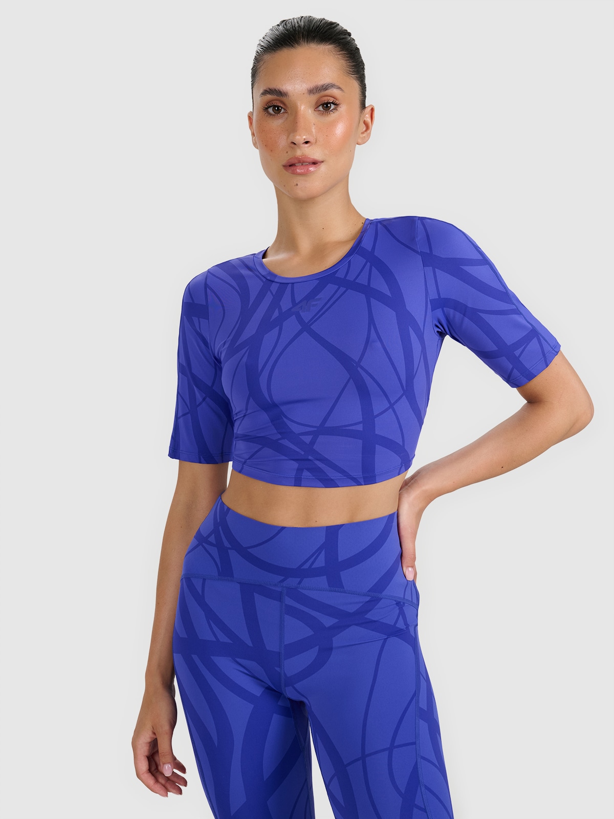 Moteriški crop - top greitai džiūstantys treniruočių marškinėliai - mėlyni