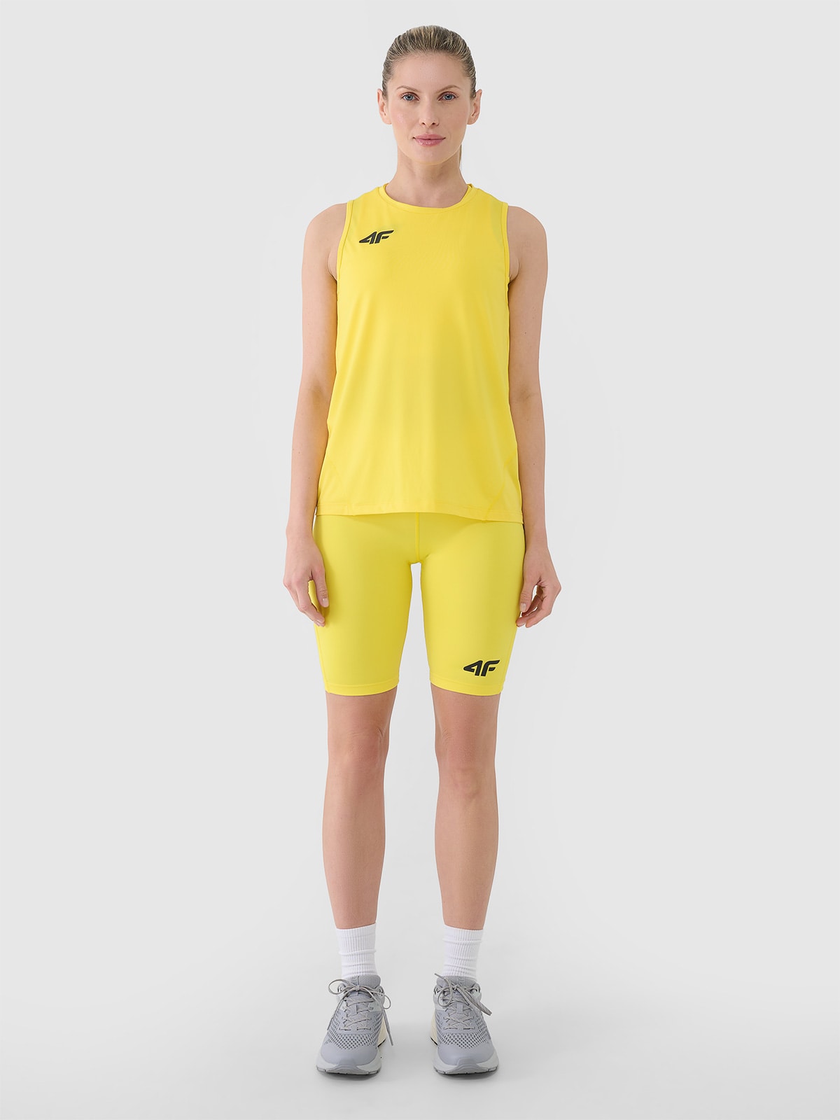 Moteriški Top greitai džiūstantys treniruočių marškinėliai - geltoni