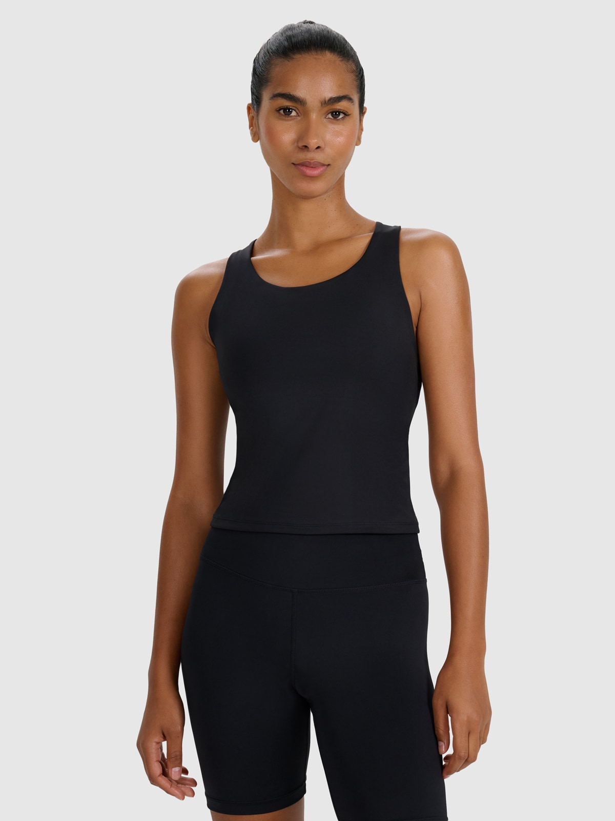 Moteriški Top greitai džiūstantys treniruočių marškinėliai - juodi