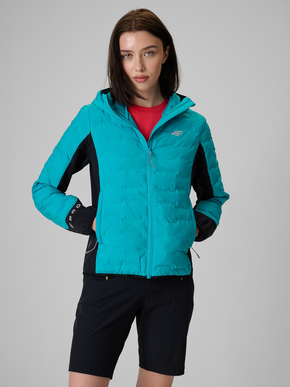 Moteriška trekingo striukė su Primaloft Silver užpildu - turkio spalvos