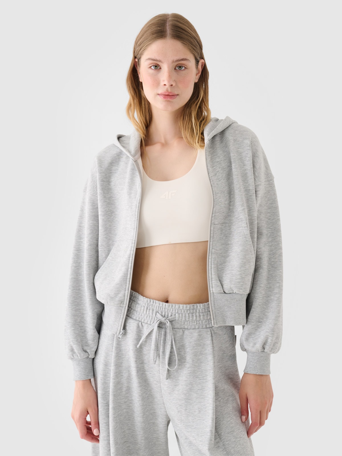 Moteriškas sportinis atsegamas džemperis su gobtuvu - pilkas