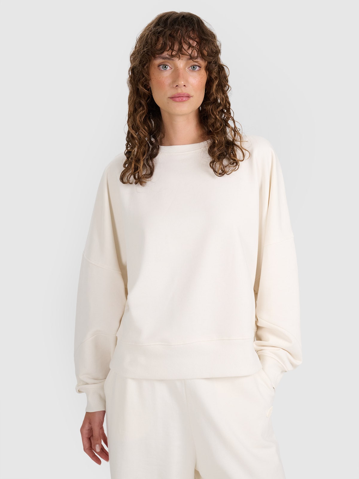 Moteriškas sportinis neatsegamas džemperis be gobtuvo - smėlio spalvos