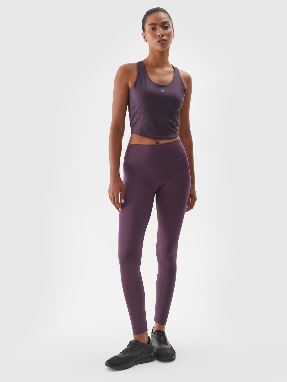 Moteriškos treniruočių tamprės su vidutiniu liemeniu - violetinės