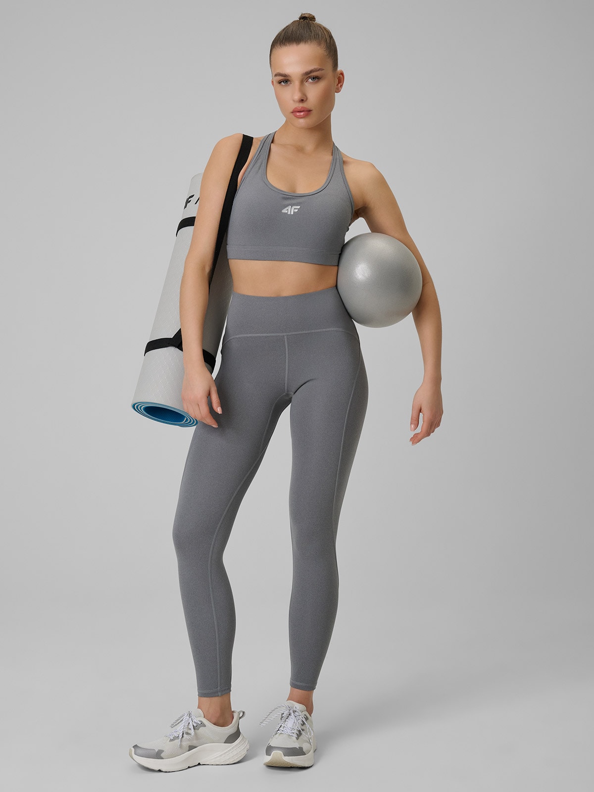 **Moteriškos greitai džiūstančios treniruočių tamprės - pilkos