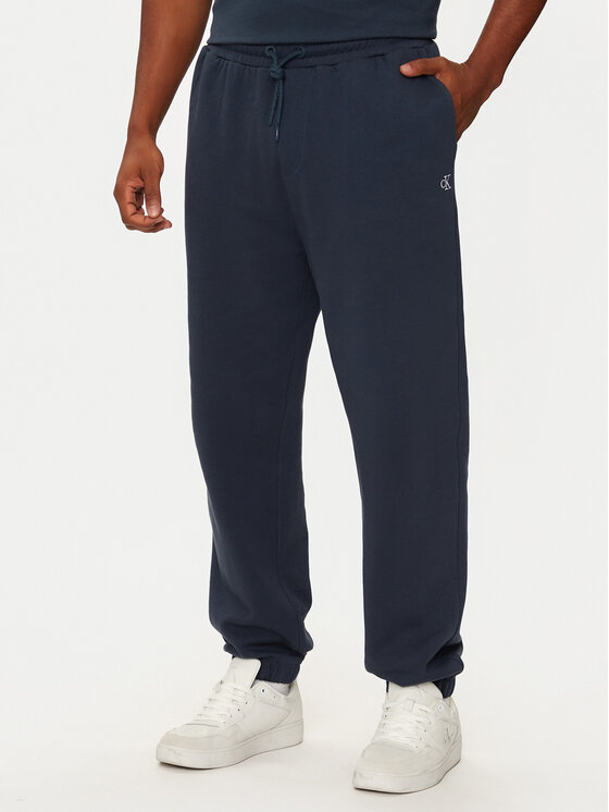 Calvin Klein Jeans Sportinės kelnės · Tamsiai mėlyna · Relaxed Fit