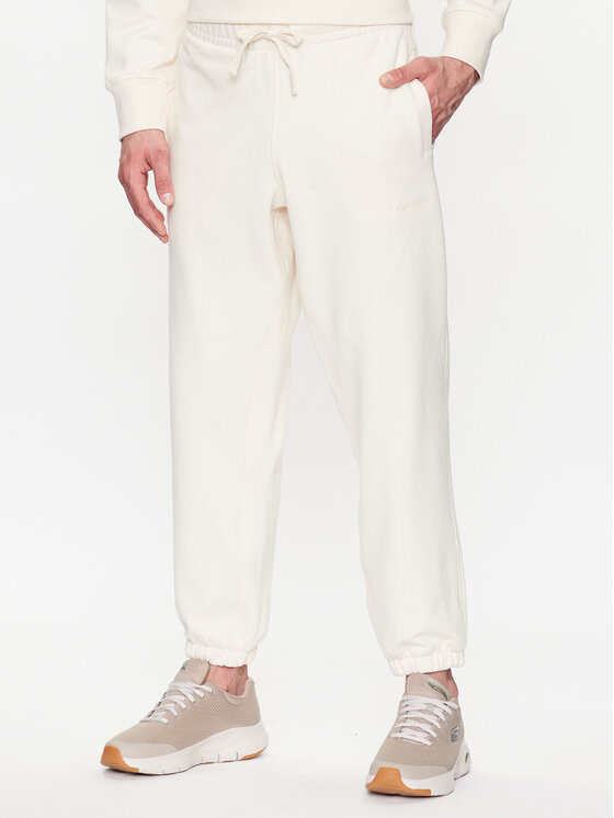 New Balance Sportinės kelnės · Écru · Relaxed Fit