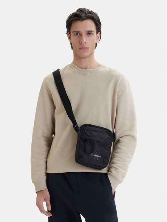 Calvin Klein Maža rankinė · Juoda