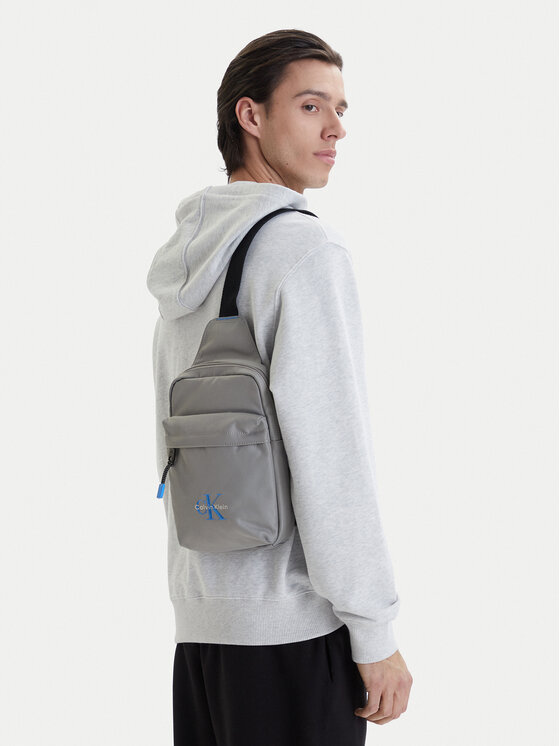 Calvin Klein Maža rankinė · Pilka