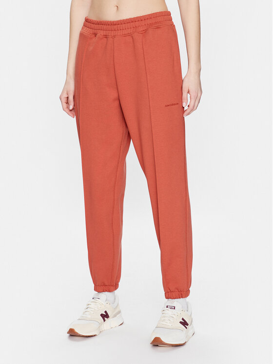 New Balance Sportinės kelnės · Oranžinė