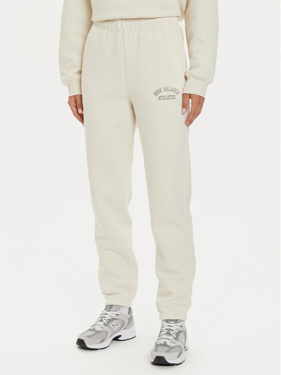 New Balance Sportinės kelnės · Smėlio · Relaxed Fit