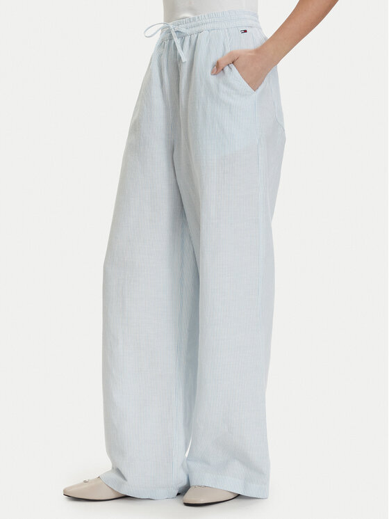 Tommy Jeans Medžiaginės kelnės · Šviesiai mėlyna · Relaxed Fit